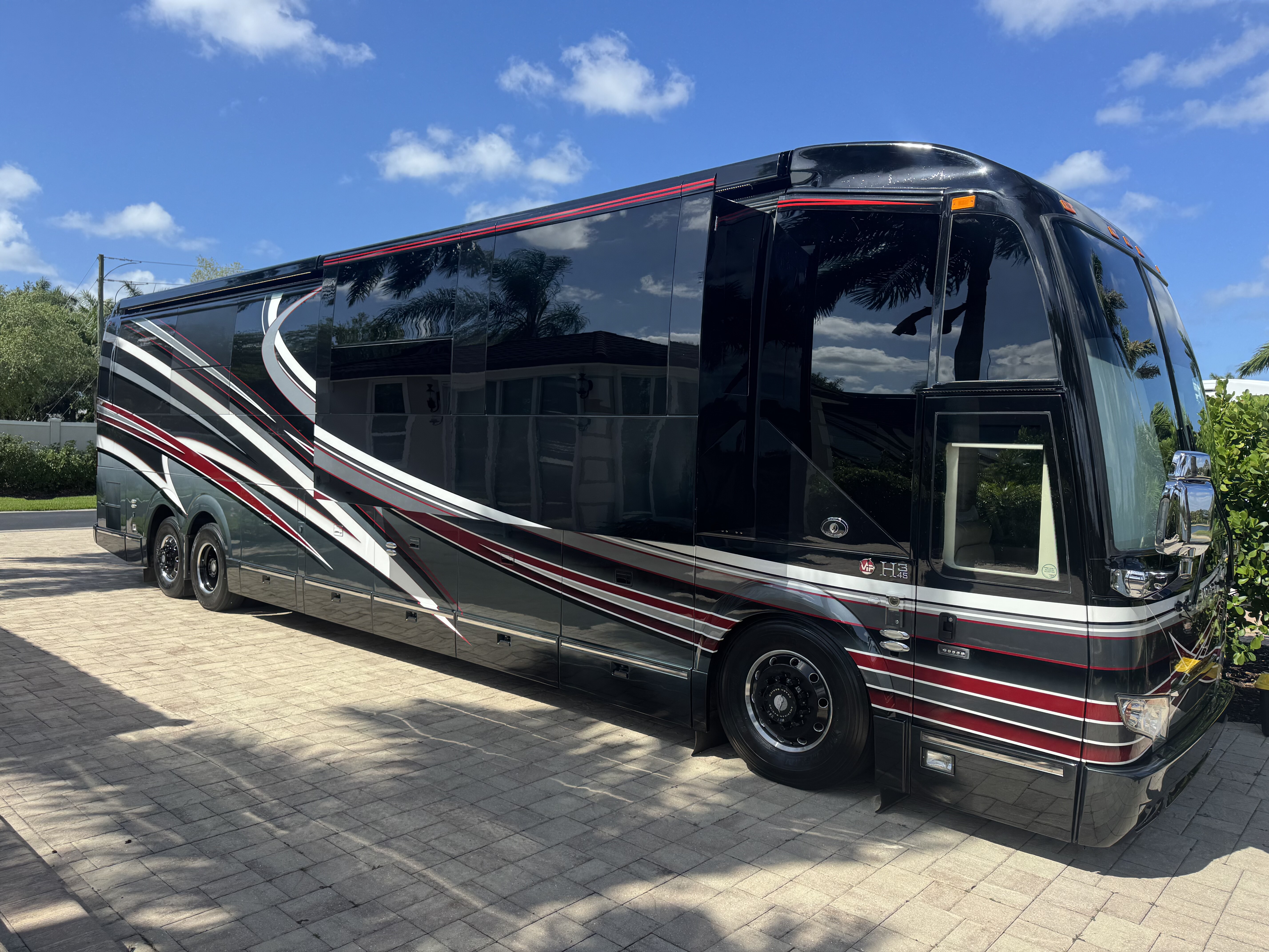 2018 Prevost Featherlite H3-45 luxury motorcoach exterior at golden hour